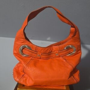 Anne Klein Vibrant Orange Hobo Bag with Gold Accents